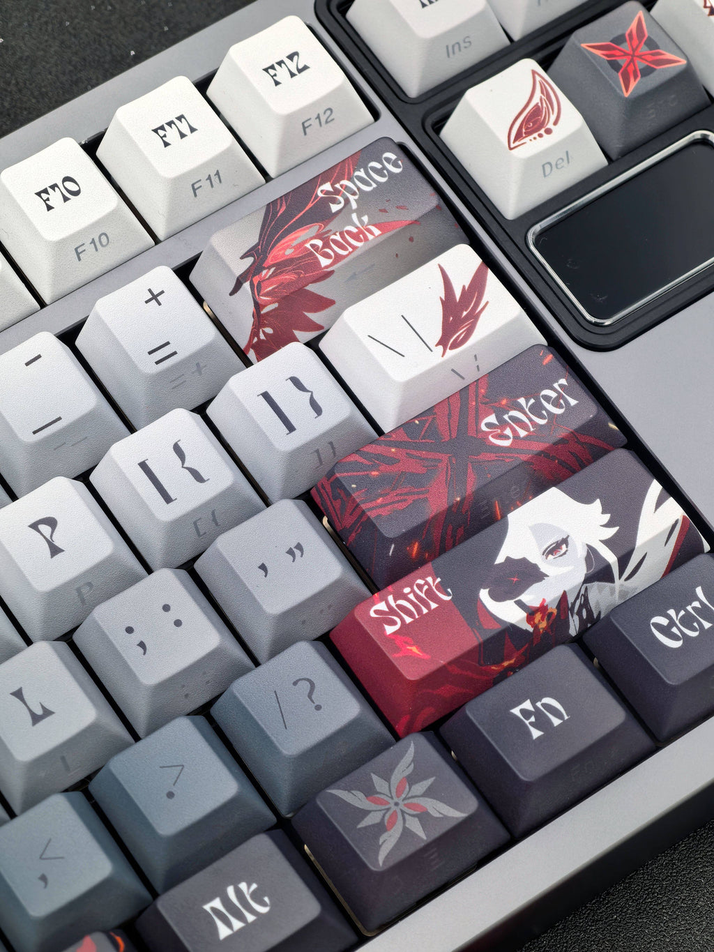 Close-up of Arlecchino Genshin Impact keycaps on a mechanical keyboard