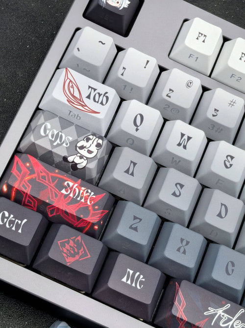 Close-up of Arlecchino Genshin Impact keycaps on a mechanical keyboard