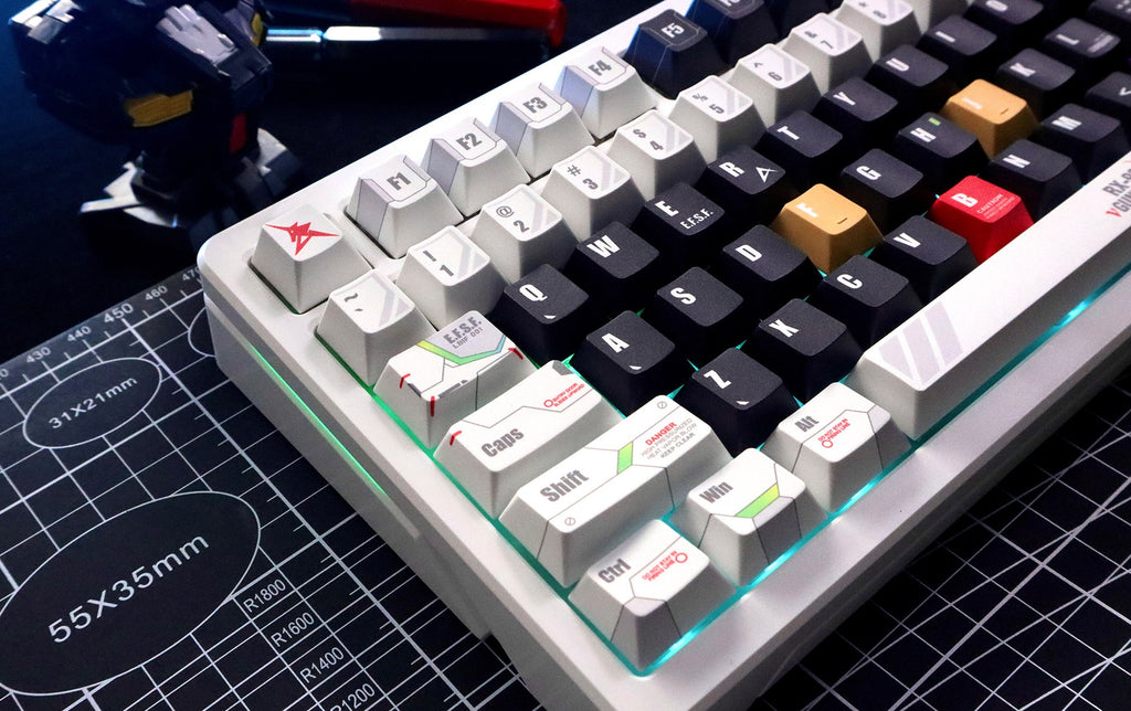Close-up of RX-93 Nu Gundam keycaps on a mechanical keyboard
