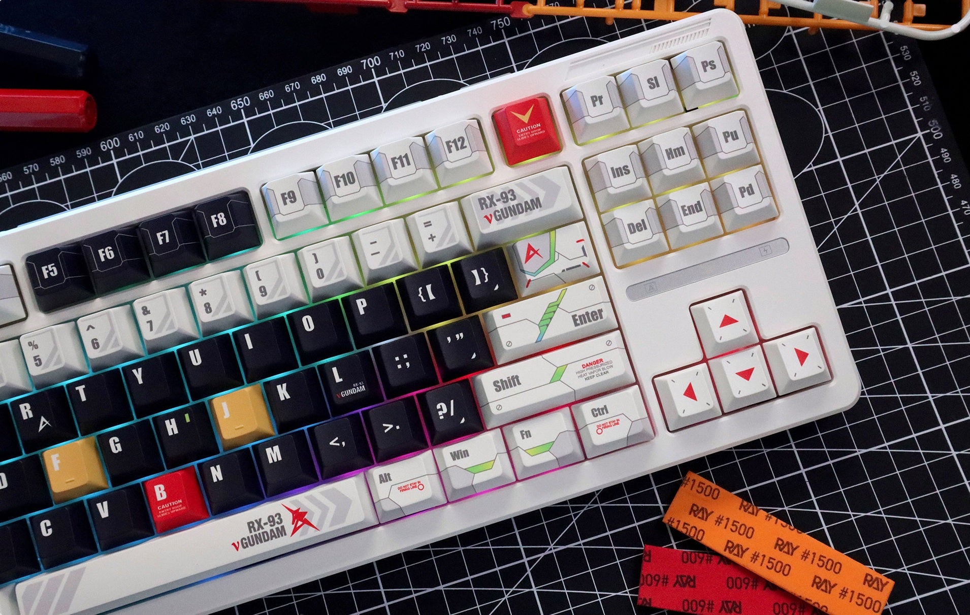 Close-up of RX-93 Nu Gundam keycaps on a mechanical keyboard
